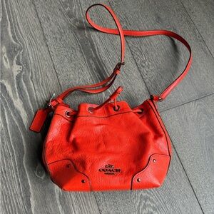Coach Baby Mickie Drawstring Grain Leather Crossbody Bag in Orange